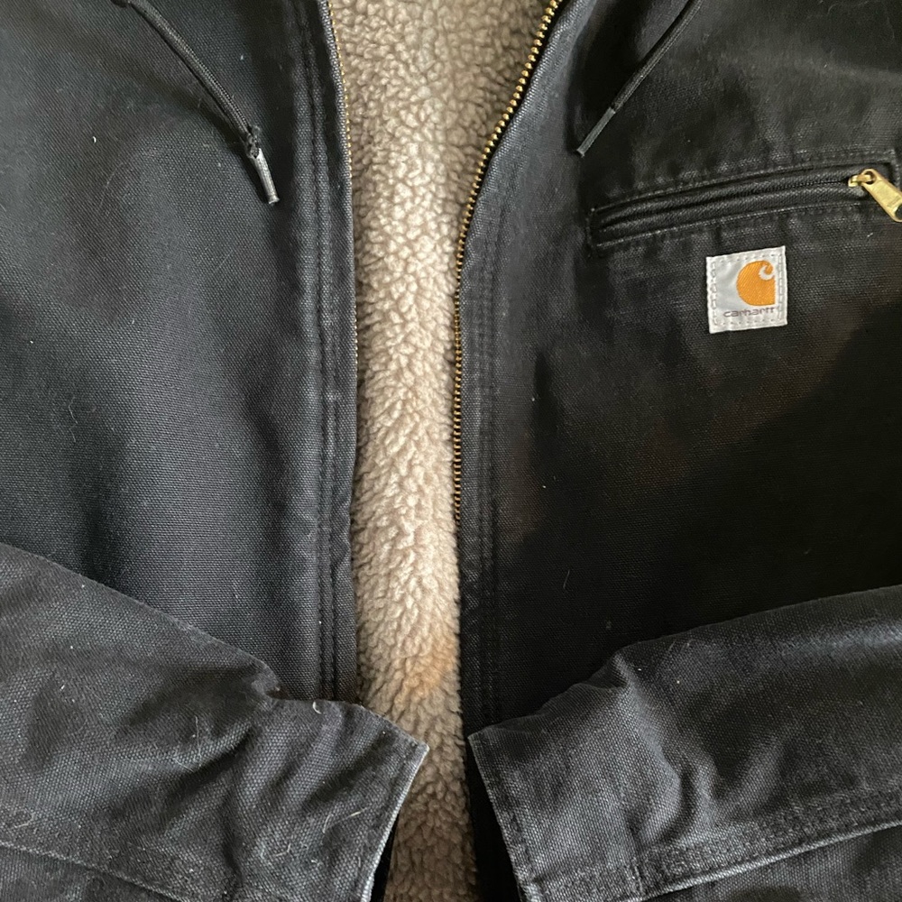 Women’s Carhartt black jacket size 12-14. Like-new. Too big for me.